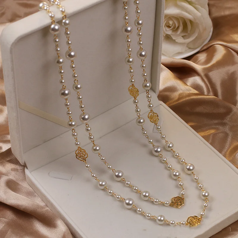 Collana elegante con perle in oro