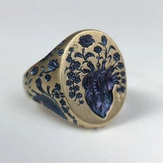 Anello vintage in oro con sigillo floreale blu