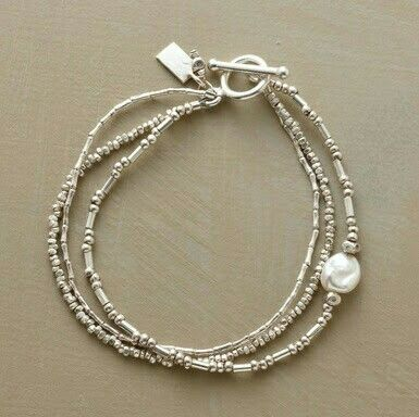 Confezione di braccialetti vintage con perle