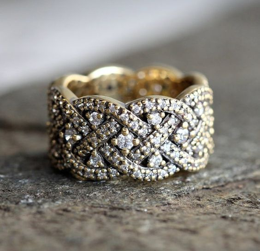 Anello vintage intrecciato con zirconi