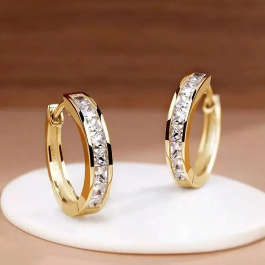 Orecchini eleganti in oro e cristallo