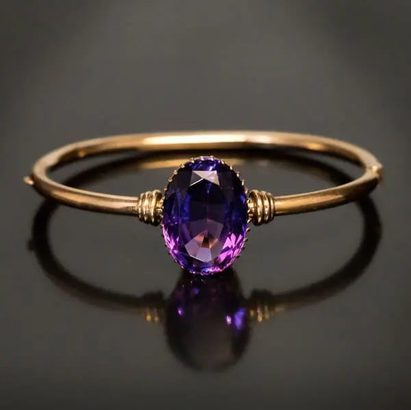 Anello con cristallo viola in oro vintage