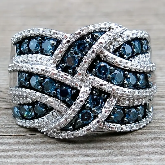 Anello luminoso intrecciato blu argento