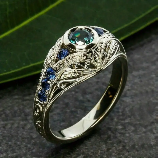 Anello di argento vuoto con cristalli blu