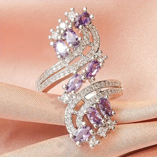 Anello elegante a spirale con zirconia e cristallo viola