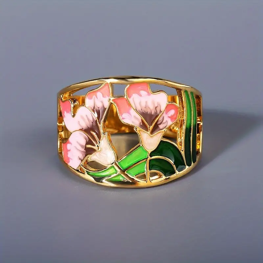 Anello a fiore dorato con smalto