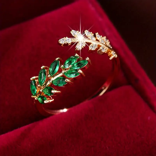 Anello aperto con foglie di zirconi verdi