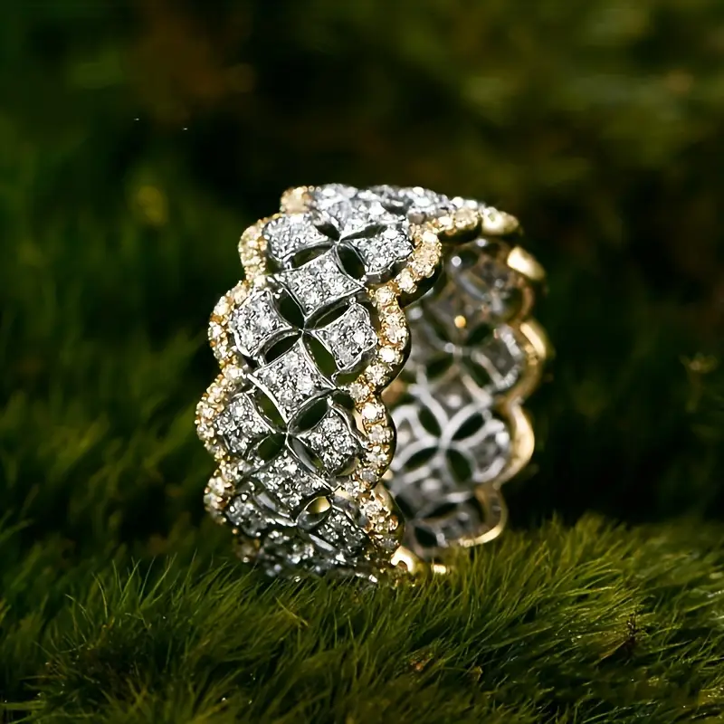 Anello vuoto in oro e argento con elementi scintillanti