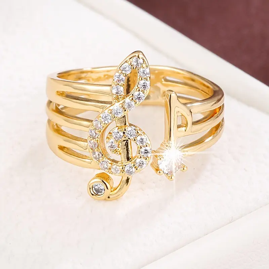 Anello con elementi musicali