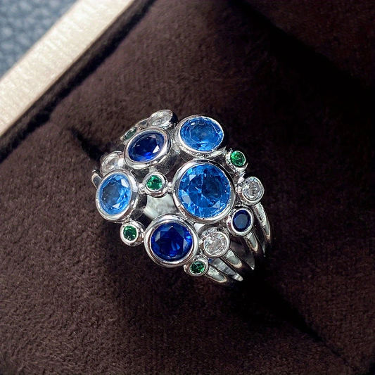 Anello in argento con bolle verdi e blu