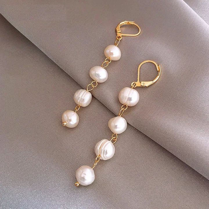 Orecchini in oro con perle