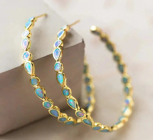 Orecchini a cerchio dorati con opale blu vintage