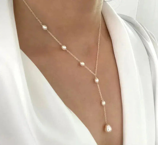 Collana vintage con pendente e perle